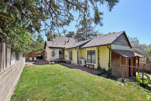 528 N Westcapitol St, Salt Lake City, UT 84103 - back of property featuring a patio area, a cooling unit, stucco siding, and roof with shingles