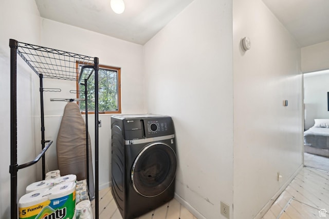 528 N Westcapitol St, Salt Lake City, UT 84103 - laundry room featuring washing machine and clothes dryer and baseboards