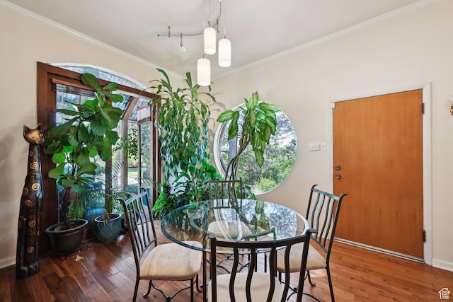 528 N Westcapitol St, Salt Lake City, UT 84103 - dining space featuring hardwood / wood-style flooring, crown molding, and baseboards