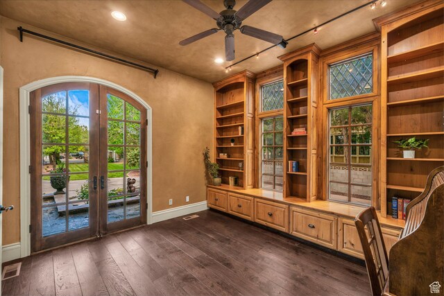 3770 Sugar Leo Rd, Bloomington, UT 84790 - unfurnished room with french doors, dark wood finished floors, a ceiling fan, and built in shelves