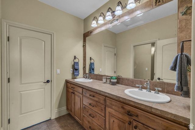 bathroom featuring tile patterned floors and double vanity