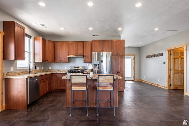 420 E Rockport Aspen Dr, Coalville, UT 84017 - kitchen with appliances with stainless steel finishes, a sink, recessed lighting, finished concrete flooring, and light stone countertops