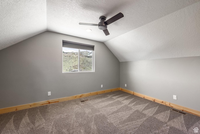 420 E Rockport Aspen Dr, Coalville, UT 84017 - bonus room with a ceiling fan, a textured ceiling, baseboards, carpet floors, and lofted ceiling