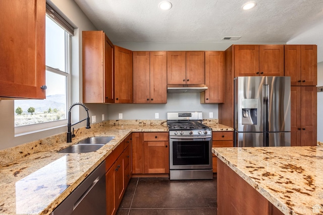420 E Rockport Aspen Dr, Coalville, UT 84017 - kitchen featuring stainless steel appliances, a sink, plenty of natural light, under cabinet range hood, and recessed lighting