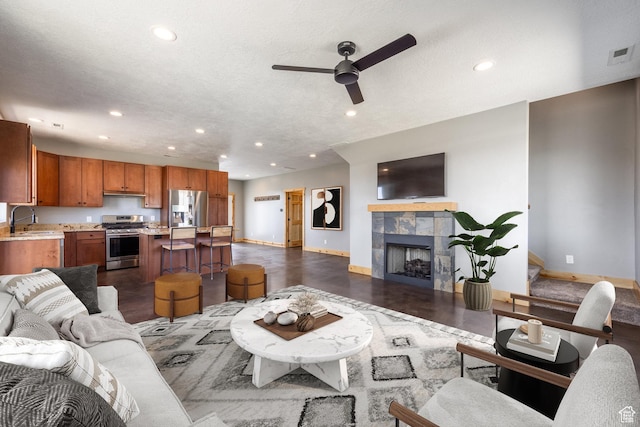 420 E Rockport Aspen Dr, Coalville, UT 84017 - living area featuring baseboards, ceiling fan, recessed lighting, and a fireplace