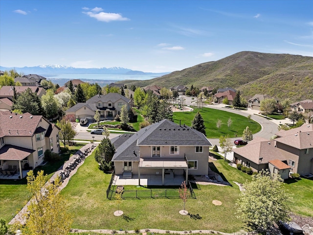 aerial perspective of suburban area featuring mountains