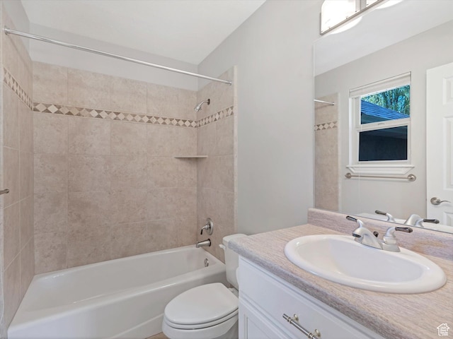 bathroom with vanity, toilet, and shower / bathtub combination