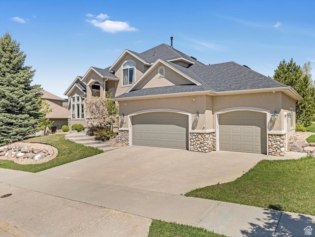 view of front of house with stucco siding, an attached garage, concrete driveway, and roof with shingles