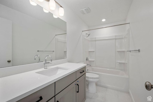 bathroom with marble look tile flooring, toilet, vanity, shower / washtub combination, and baseboards