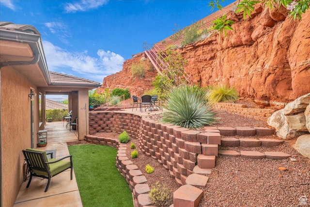 1668 W Lakota Dr, St George, UT 84770 - view of yard with a patio
