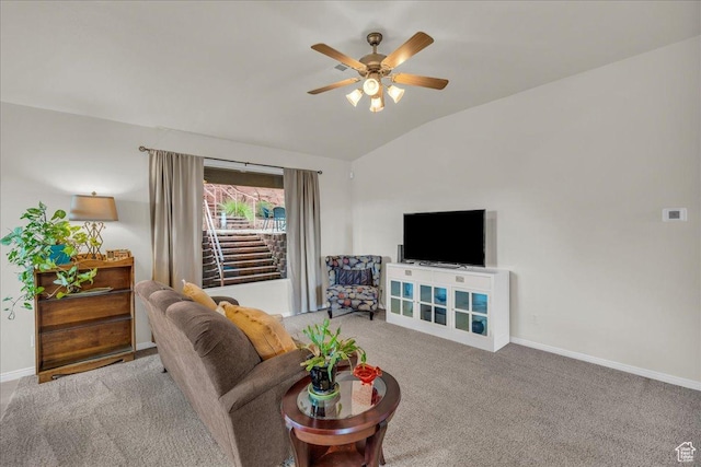1668 W Lakota Dr, St George, UT 84770 - carpeted living room with lofted ceiling, ceiling fan, and baseboards