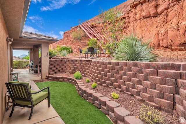1668 W Lakota Dr, St George, UT 84770 - view of yard with a patio area