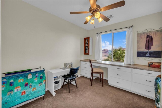 1668 W Lakota Dr, St George, UT 84770 - office area featuring carpet flooring, a ceiling fan, built in study area, and baseboards