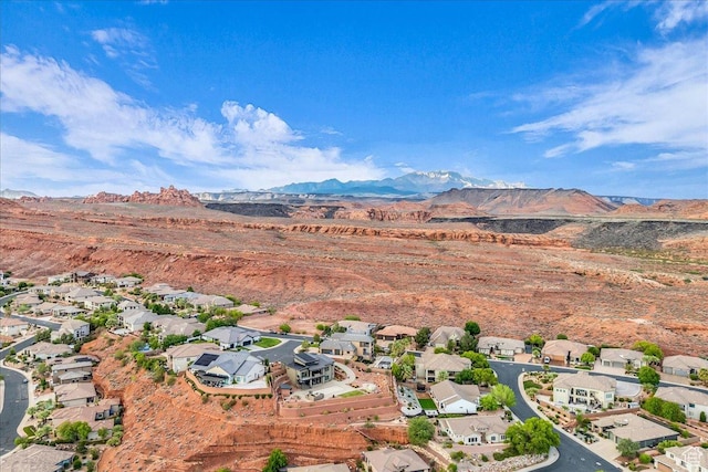 1668 W Lakota Dr, St George, UT 84770 - aerial view of property and surrounding area with nearby suburban area and a mountain backdrop