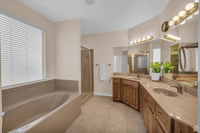 1668 W Lakota Dr, St George, UT 84770 - full bathroom featuring a stall shower, a garden tub, tile patterned flooring, and double vanity