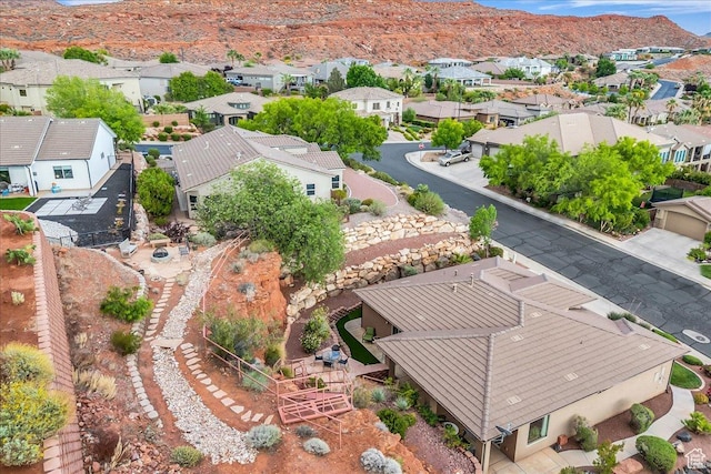 1668 W Lakota Dr, St George, UT 84770 - aerial view of residential area with a mountain backdrop