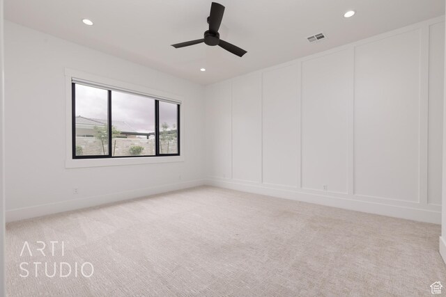 3855 S Kennedy Ln, Washington, UT 84780 - spare room with light colored carpet, a decorative wall, recessed lighting, and ceiling fan