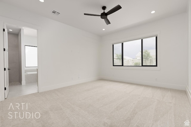3855 S Kennedy Ln, Washington, UT 84780 - unfurnished bedroom with light carpet, recessed lighting, baseboards, ensuite bathroom, and a ceiling fan