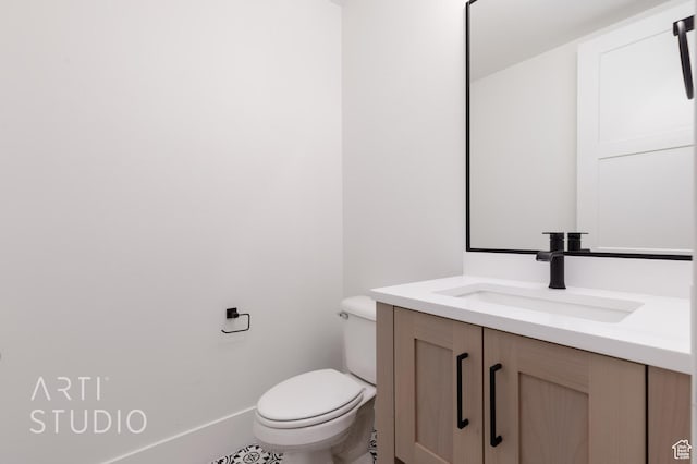 3855 S Kennedy Ln, Washington, UT 84780 - half bathroom with toilet, vanity, and baseboards