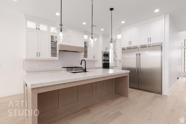 3855 S Kennedy Ln, Washington, UT 84780 - kitchen with built in appliances, a sink, white cabinets, and recessed lighting