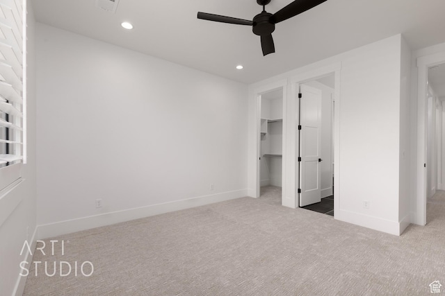 3855 S Kennedy Ln, Washington, UT 84780 - unfurnished bedroom with carpet flooring, a walk in closet, baseboards, and recessed lighting