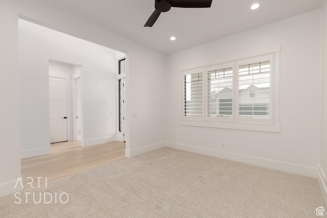 3855 S Kennedy Ln, Washington, UT 84780 - unfurnished room featuring ceiling fan, recessed lighting, light carpet, baseboards, and light wood-style floors
