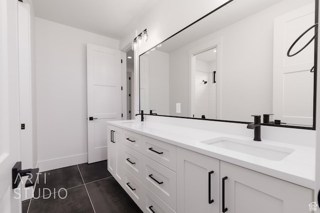 3855 S Kennedy Ln, Washington, UT 84780 - full bath with double vanity, tile patterned flooring, and baseboards