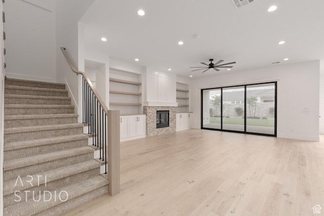 3855 S Kennedy Ln, Washington, UT 84780 - unfurnished living room with recessed lighting, stairway, ceiling fan, baseboards, and light wood-style flooring