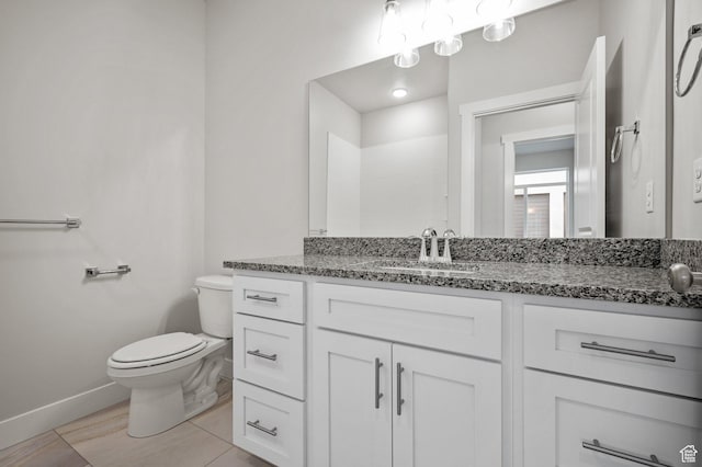 464 E Depot St Unit 114, Clearfield, UT 84015 - bathroom with toilet, baseboards, and vanity
