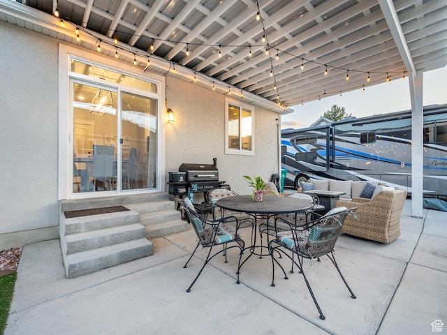 view of patio with entry steps and grilling area
