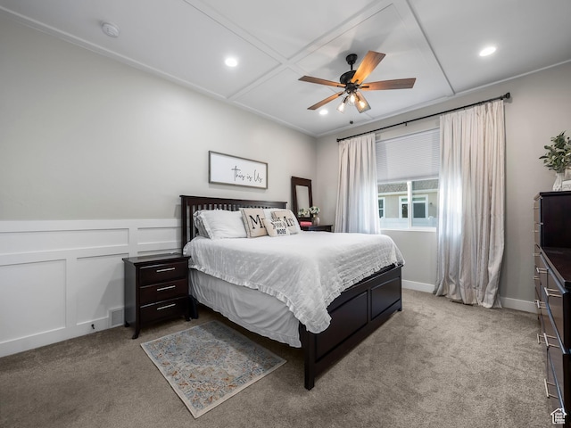 carpeted bedroom with a decorative wall, recessed lighting, and ceiling fan