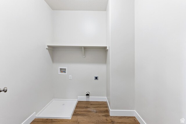2363 E 370 N Unit 07, Spanish Fork, UT 84660 - laundry room featuring hookup for a washing machine, electric dryer hookup, wood finished floors, and baseboards