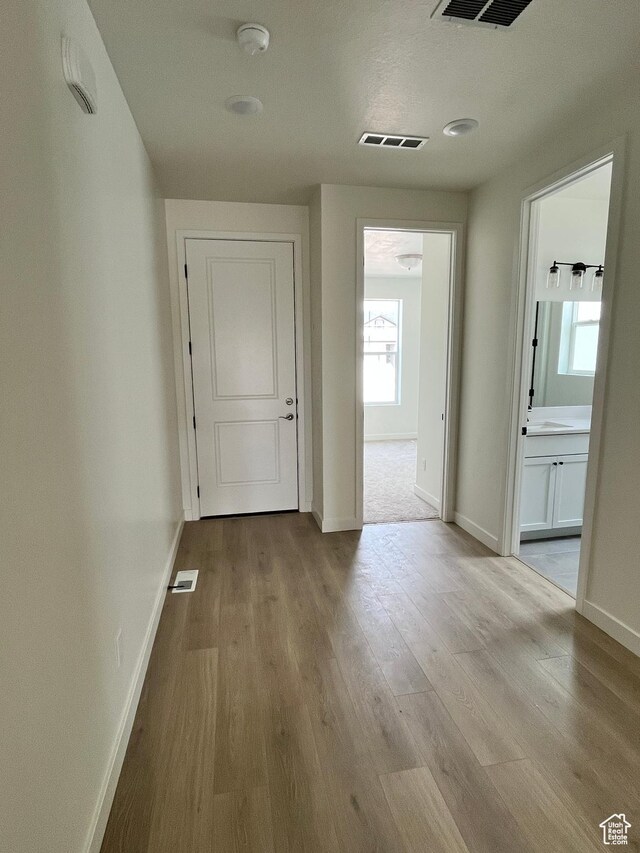 2055 S 4140 W, Taylor, UT 84401 - hallway with wood finished floors and baseboards