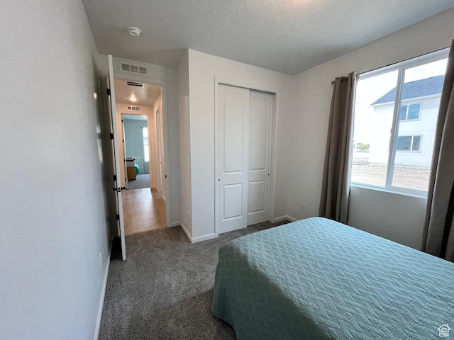 2055 S 4140 W, Taylor, UT 84401 - carpeted bedroom featuring a closet and baseboards