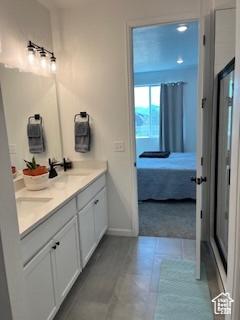 2055 S 4140 W, Taylor, UT 84401 - full bathroom featuring ensuite bathroom, double vanity, and tile patterned floors