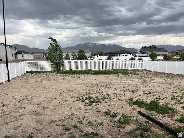 2055 S 4140 W, Taylor, UT 84401 - fenced backyard with a mountain view and a residential view