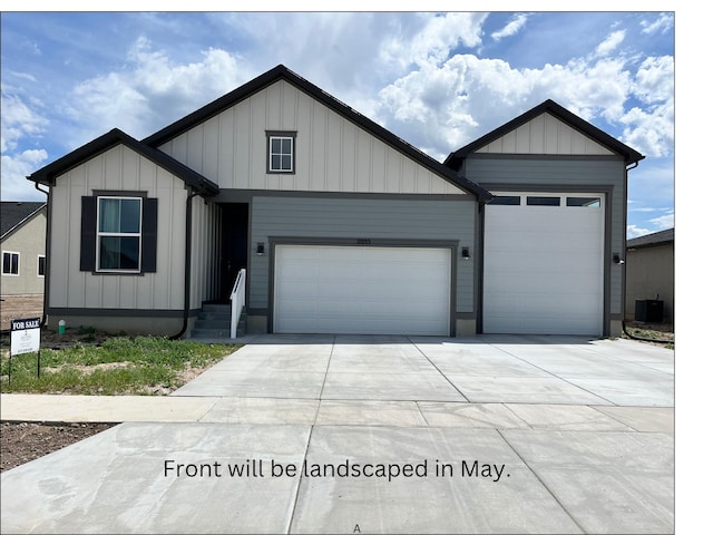 2055 S 4140 W, Taylor, UT 84401 - view of front facade with an attached garage and concrete driveway