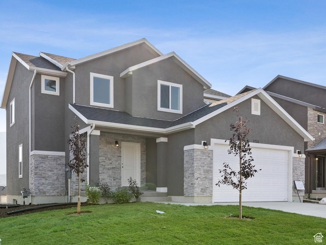 2371 E 370 N Unit 08, Spanish Fork, UT 84660 - view of front of house with stone siding, stucco siding, a front lawn, and an attached garage