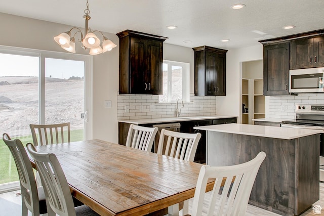 362 N 2350 E Unit 10, Spanish Fork, UT 84660 - dining area with a chandelier and recessed lighting
