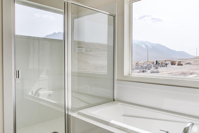 362 N 2350 E Unit 10, Spanish Fork, UT 84660 - full bathroom featuring a mountain view, a shower stall, and a bath