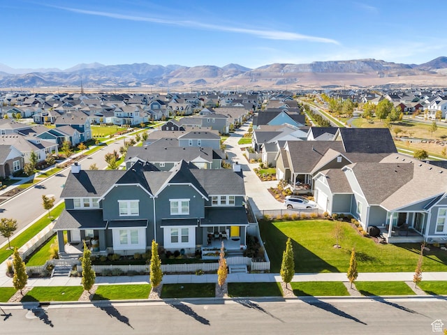 aerial perspective of suburban area featuring a mountainous background