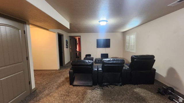 cinema room featuring carpet and baseboards