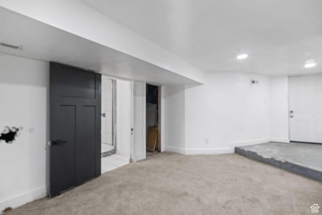 8885 W Magna Main St, Magna, UT 84044 - finished below grade area featuring carpet flooring, baseboards, and recessed lighting