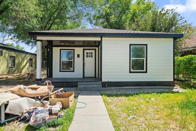 8885 W Magna Main St, Magna, UT 84044 - view of front of house with a porch