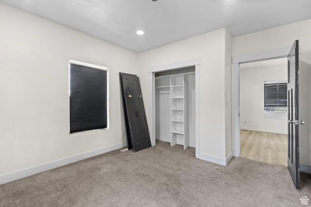 8885 W Magna Main St, Magna, UT 84044 - unfurnished bedroom featuring carpet floors, baseboards, a closet, and recessed lighting