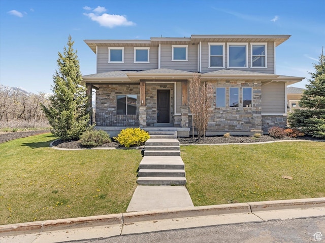 view of front of property with stone siding, a porch, and a front yard