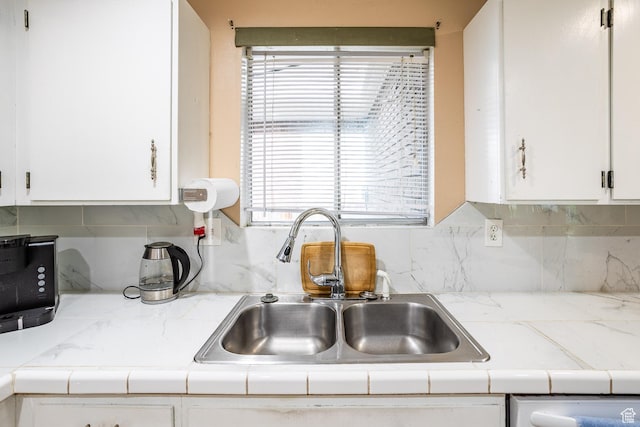 853 N 1250 W, Provo, UT 84604 - kitchen featuring a sink, white cabinets, light countertops, and tasteful backsplash
