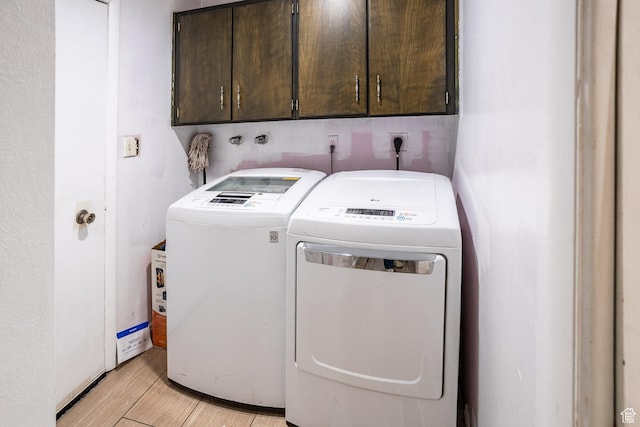 853 N 1250 W, Provo, UT 84604 - laundry area with cabinet space, washing machine and dryer, and light wood-style flooring