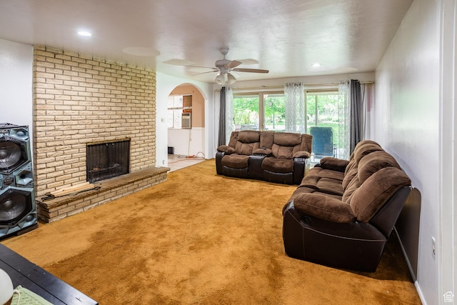 853 N 1250 W, Provo, UT 84604 - carpeted living room with ceiling fan, a fireplace, and arched walkways