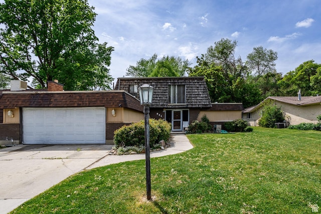 853 N 1250 W, Provo, UT 84604 - view of front property with mansard roof, brick siding, a front lawn, driveway, and a garage